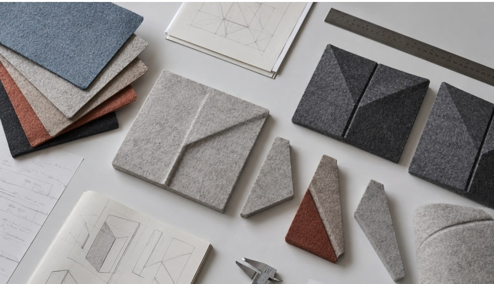 Felt samples, sketches, and geometric prototypes under development